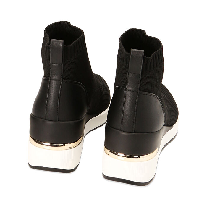 Slip on donna nere in tessuto zeppa 7 cm Primadonna Collection