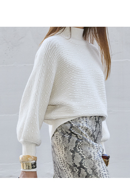 Prendas de punto beige claro en tela