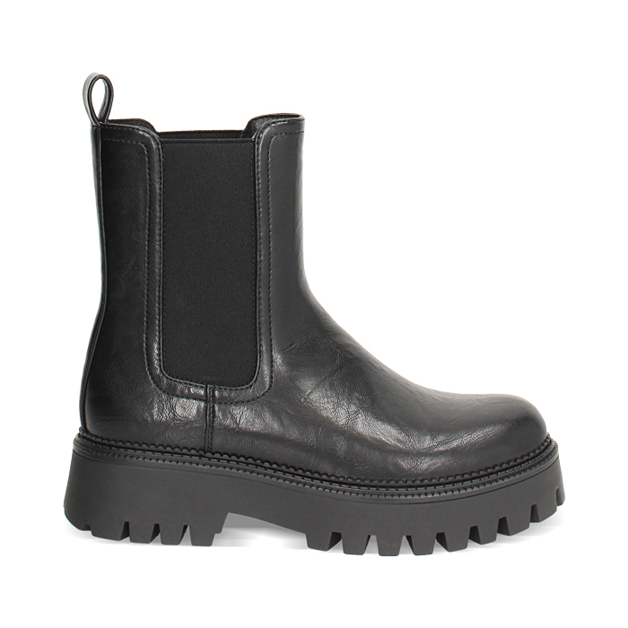 Boots Beatles noirs avec talon de 5 cm pour un look audacieux