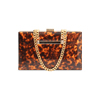 Clutch leopardata in vernice