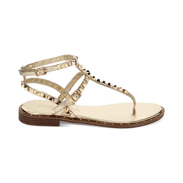 Sandalias planas doradas en laminado